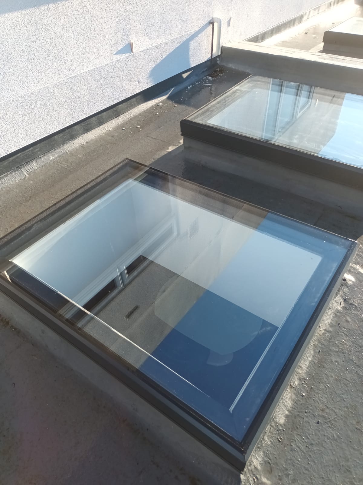 Two roof lights on a flat roof